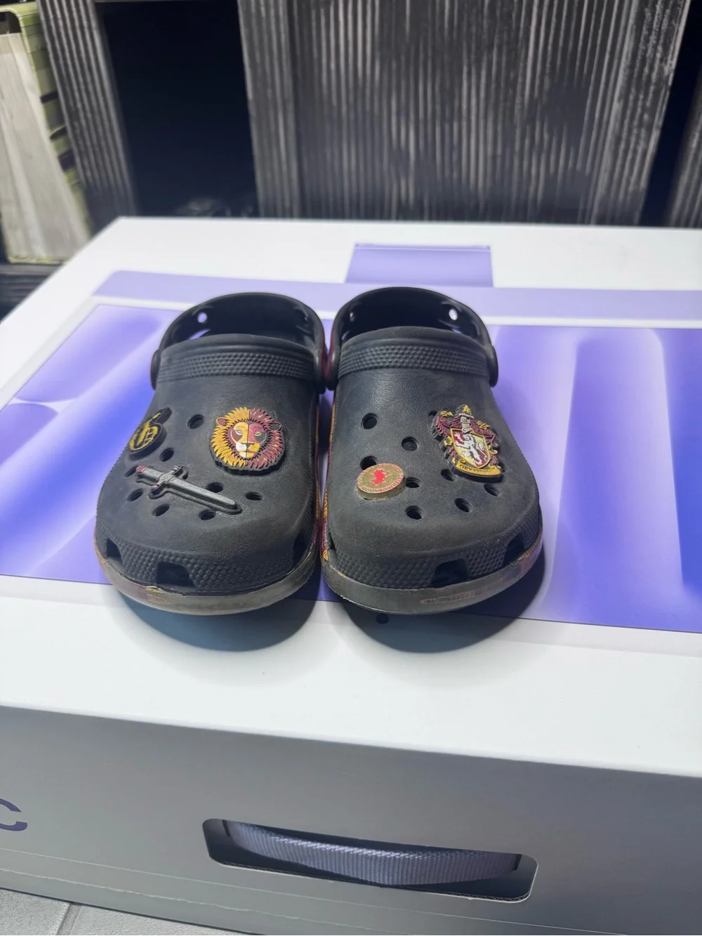 CROCS Kids Black Clogs with Red & Yellow Stripe Accents
